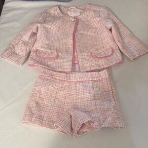 Pink tweed suit